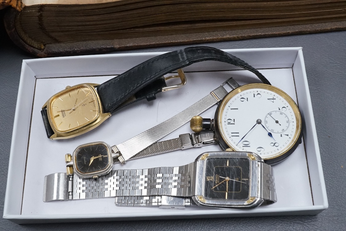 An early 20th century Photograph album of European views and a group of watches